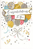 The artwork on this congratulations card feels like holding a small, contained celebration in your hands, filled with subtle metallic sheen and playful details. At its heart, a lush bunch of balloons rises from the bottom area of the card, overlapping in layers that create a sense of depth and movement. The balloons are painted in harmonious tones of gold, silver, champagne, sky blue, soft pink, and quiet grey, with careful highlights that make each sphere seem plump and gently reflective, like balloons catching the overhead lights at a party near Greenford Broadway. Some are adorned with star patterns that twinkle as you move the card, others with narrow glitter stripes or tiny speckles, hinting at texture even though the surface is smooth. From the base of the cluster, slim strings in metallic gold and silver curl downwards, crossing and looping in loose, graceful lines that echo the trailing ribbons we use on celebratory bouquets around Greenford. The background is alive with miniature stars, scattered dots, and curling streamers that sweep in gentle arcs, suggesting confetti left suspended in mid-air at the height of a joyful moment. Floating across the centre, a soft banner curves elegantly, as if lifted by the balloons themselves. On it, in flowing, expressive script, are the words Congratulations To You, the lettering giving the impression of care and intention, like a personal note penned with pride. The overall effect is light, sparkling, and warm-perfect for pairing with fresh flowers to honour exam results, a new home, a promotion, or any special achievement celebrated across Greenford and the surrounding neighbourhoods.